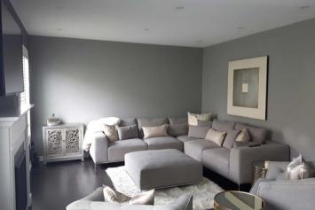 modern looking living room painted with grey walls